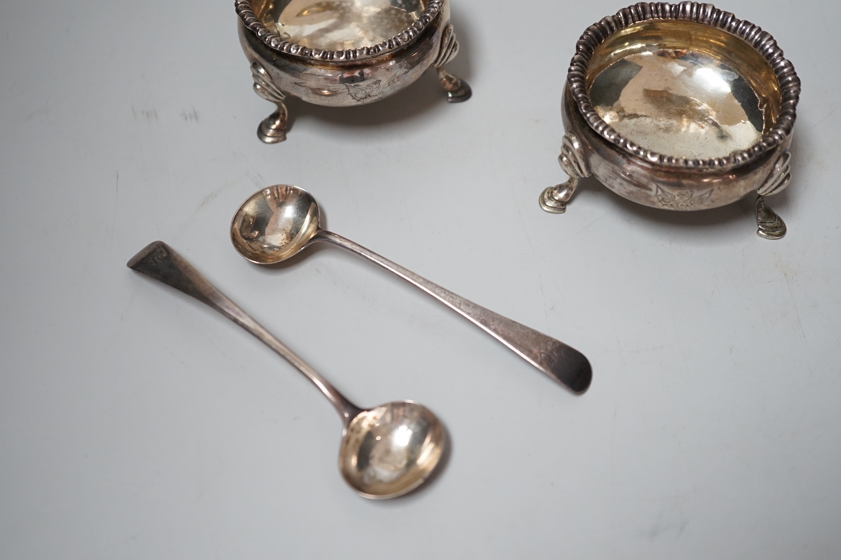 A pair of George III silver salts, London, 1778 and two later spoons, an Edwardian silver cream jug and a 925 specimen vase on stand.